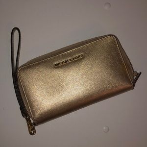 Michael Kors gold wallet/clutch